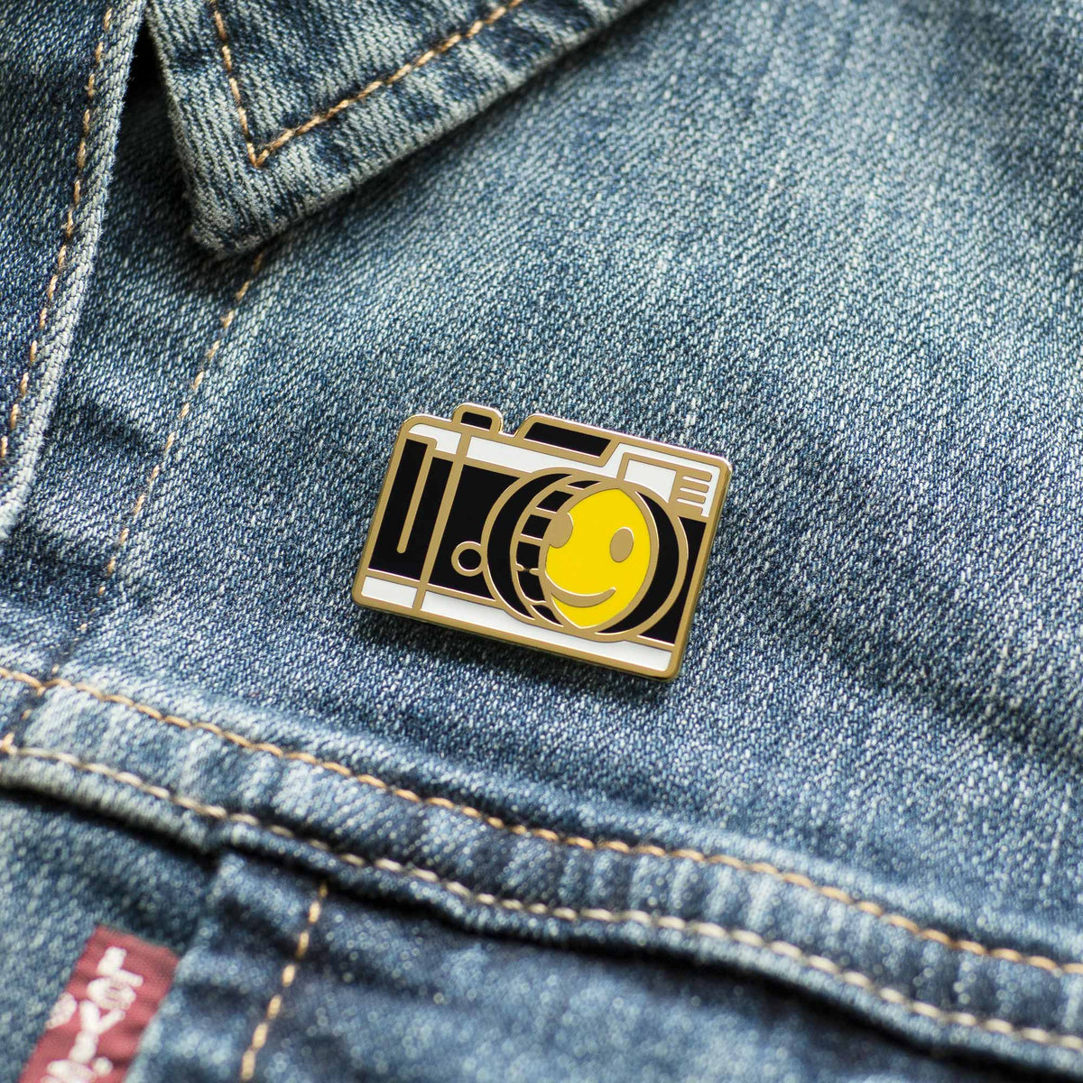 Smiley Face Vintage Camera hard enamel pin on denim jacket
