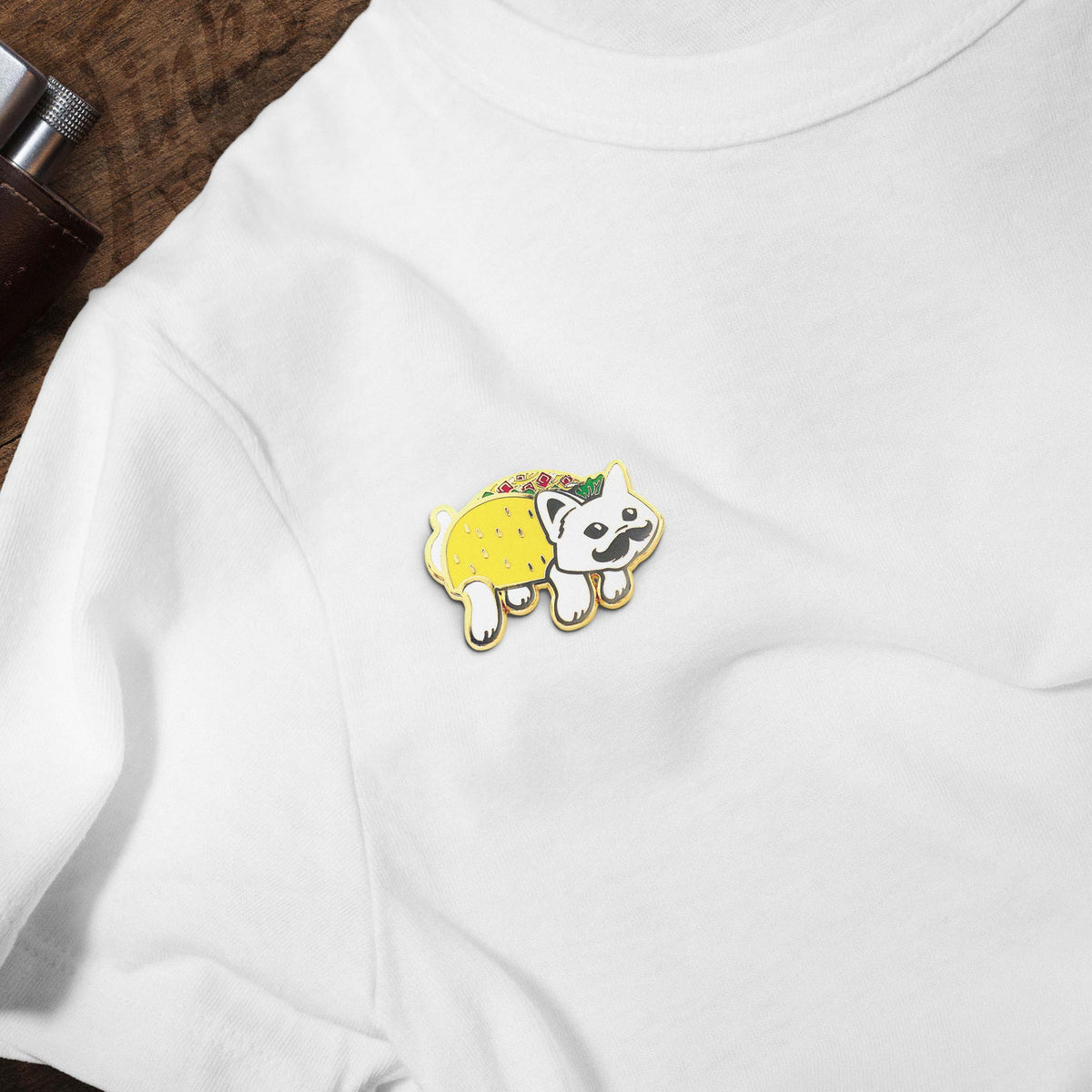 Taco Cat Spelled Backwards Is Taco Cat hard enamel pin on white t-shirt
