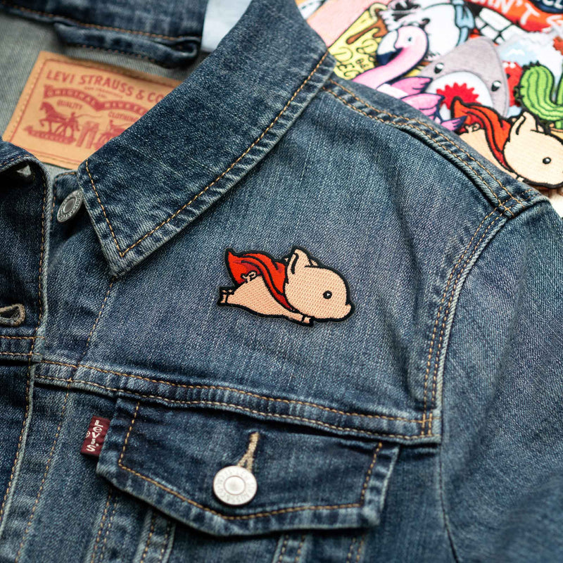 Flying Pig with Red Superhero Cape patch on denim jacket