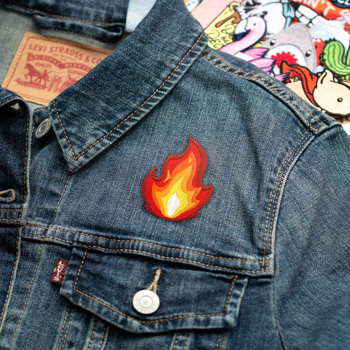 It's Fire patch on denim jacket