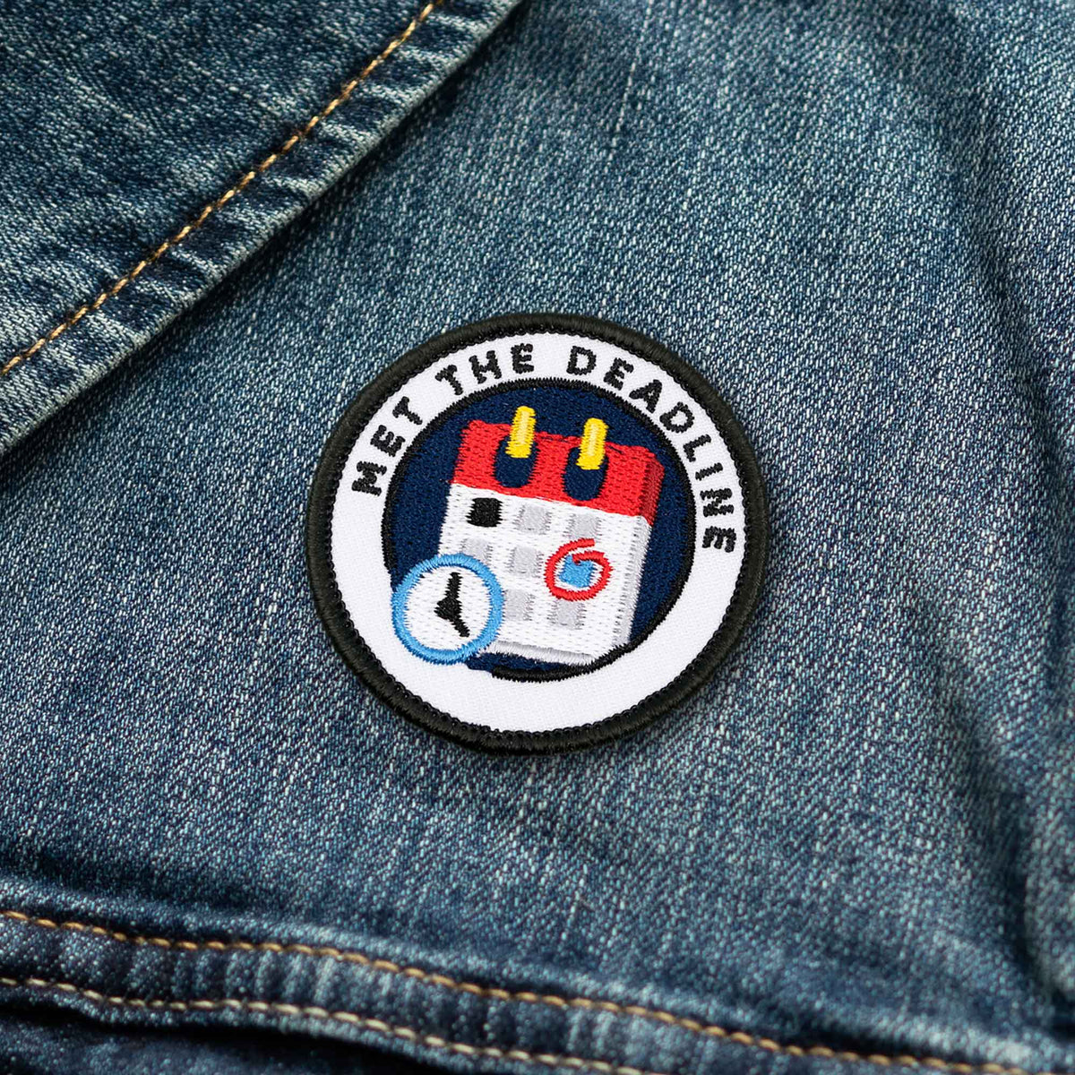 Met The Deadline adulting merit badge patch for adults on denim jacket