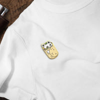 Purrito Burrito Cat hard enamel pin on white t-shirt