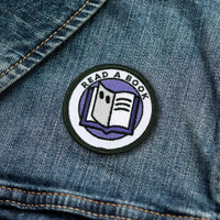 Read A Book adulting merit badge patch for adults on denim jacket