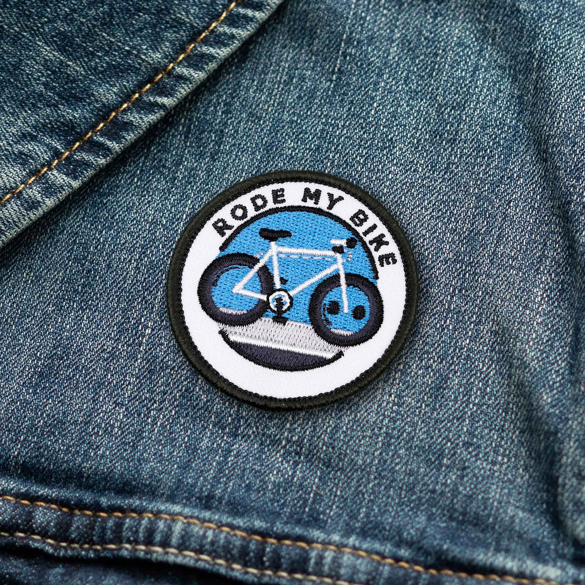 Rode My Bike adulting merit badge patch for adults on denim jacket