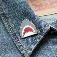 Shark Emoji hard enamel pin on denim jacket