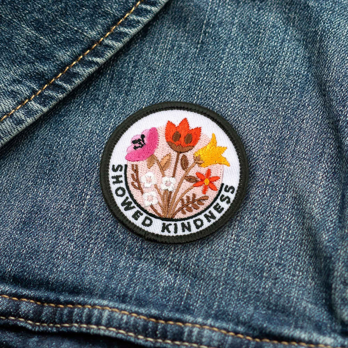 Showed Kindness adulting merit badge patch for adults on denim jacket