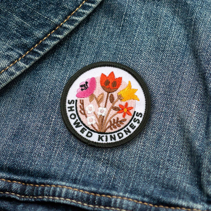 Showed Kindness adulting merit badge patch for adults on denim jacket
