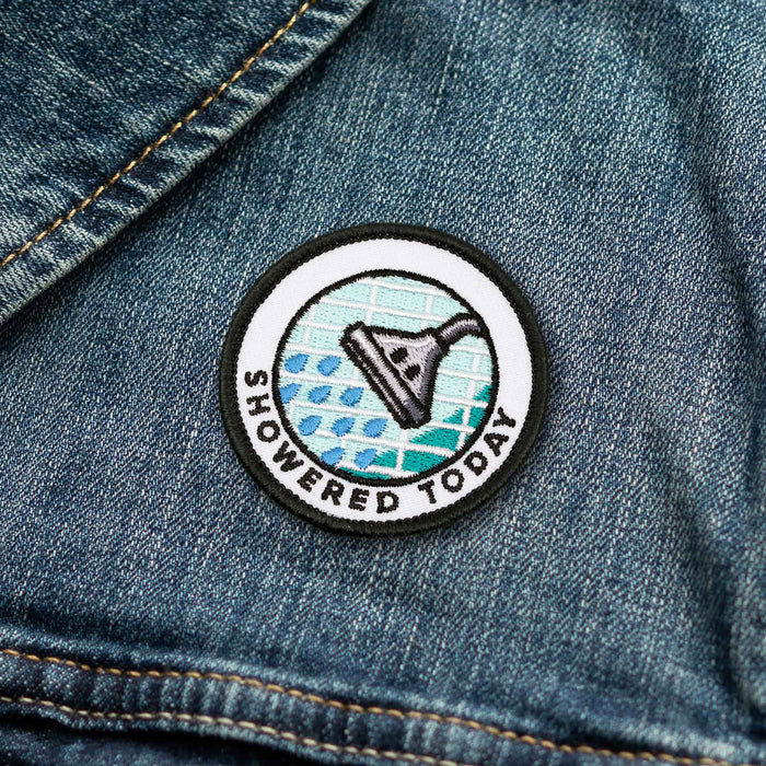Showered Today adulting merit badge patch for adults on denim jacket
