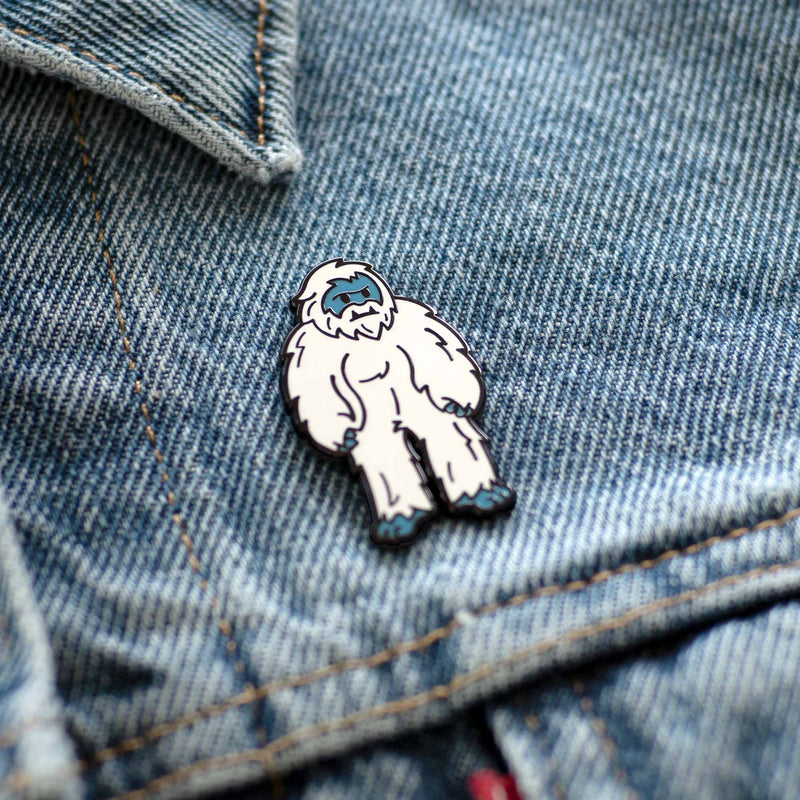 Yeti Abominable Snowman hard enamel pin on denim jacket